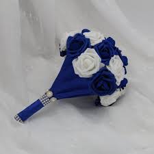 Roses dahlia and ranunculus with dusty blue and navy flower accents. Royal Blue Wedding Bouquet And White Roses Bridal Wedding Flowers Vanrina