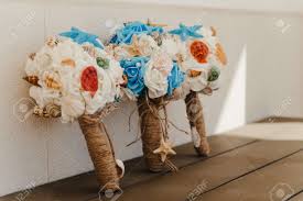Maybe you would like to learn more about one of these? Three Wedding Bouquets Diy Made Of Seashells And Silk Beautiful Idea For The Wedding Ceremony Or Vow Renewal Stock Photo Picture And Royalty Free Image Image 147011371