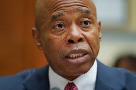 While not accused, Adams plays recurring role in sweeping indictment