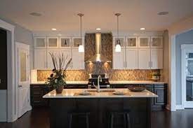 Try matching your dark shade with other dark elements in your kitchen. Midcontinent Cabinetry 2012 Contest Honorable Mention Contemporary Kitchen Beautiful Kitchen Cabinets Walnut Kitchen Cabinets