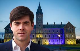 Carol singing by candlelight at St Flannan's College