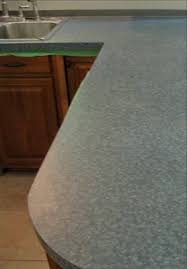 Reglazing bathtubs, refinishing countertops & cabinets in the springfield area. Countertop Refinish Stone Countertop Refinishing Multicolor Countertop Refinish
