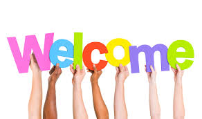 hands holding a sign of welcome
