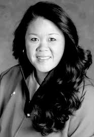 Izzy Pacho had dreams of being a softball coach. She's fulfilling those  dreams.