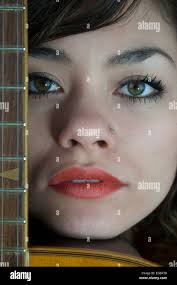 Portrait of beautiful girl half English half Thai in sport look isolated in  black and white Stock Photo