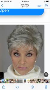 This is Ellie Reilly, senior art director at Jon Hala London in Canary  Wharf and some of her work. Born into a hairdressing family, she was  adamant she wouldn't follow in her