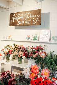 Pin By Zoe Mcaskin On Shop Displays In 2020 Flower Shop Interiors Flower Shop Design Communal Coffee