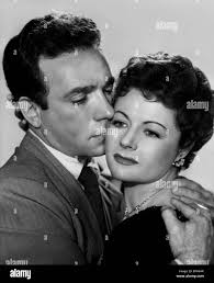 DANE CLARK, MARGARET LOCKWOOD, HIGHLY DANGEROUS, 1950 Stock Photo