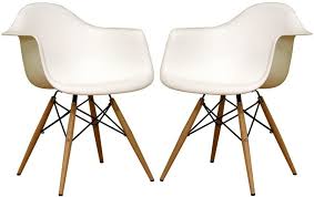 The Iconic Scooped Mid Century Silhouette Of Our Lisette Tower Arm Chair Is The Perfect Additi White Plastic Chairs Midcentury Modern Dining Chairs Eames Chair