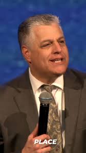 Pastor Raymond Woodward preaching