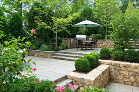 Wellesley Ma Tiered Stone Patio With Grill And Boxwoods Landscape Design Patio Landscape Design Patio Landscaping Landscape Design