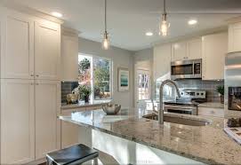 Keep your kitchen cabinets up to date with a modern makeover. Cream Shaker Kitchen Cabinets Custom Cabinetry In Denver Stone International