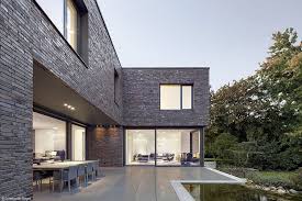 Backstein Und Transparenz Dusseldorf Cube Magazin Fassade Haus Haus Architektur Haus Design