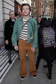 Harry styles wearing black vertical striped. Harry Styles Best Fashion Moments British Gq