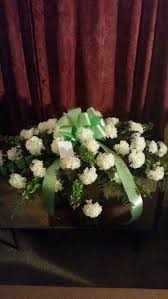Silk Casket Spray With Off White Carnations And Bells Of Ireland Casket Sprays White Carnation Casket