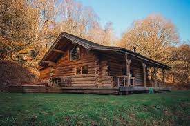 State park cabins sleep from three to eight persons and are equipped with wooden sleeping platforms, a table, chairs or benches, and a nearby latrine. The Lodge Canopy Stars