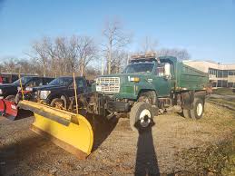 Vintage Ford F-800 Tow Truck with Plow from the Early 1960s