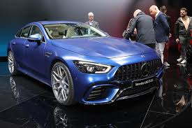 The 2019 Mercedes Amg Gt 4 Door Coupe Made Its Debut At The Geneva Motor Show And Amg Boss Tobias Moers Had A Lot Mercedes Amg Mercedes Benz Amg Mercedes Benz