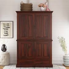 Plug in and charge your devices Avon 4 Door Large Solid Wood Media Tv Armoire With Drawers