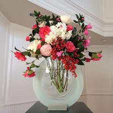 Flower Arrangement With Camellias Azaleas Hydrangeas And Nandina Berries Flower Arrangements Garden Art Flowers