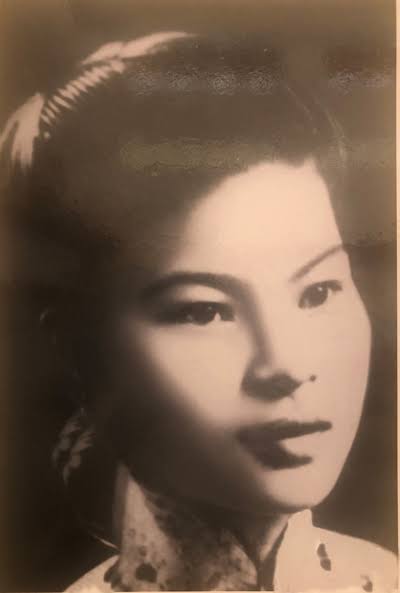 Chân dung Anh hùng Lực lượng Vũ trang Nhân dân Phan Thị Ràng (1934 - 1962)., do AI tạo