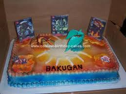 She placed chocolate covered graham crackers in the middle for the bakugan battleground and real bakugan cards with real bakugans on top. Coolest Homemade Bakugan Cake For 9th Birthday Party
