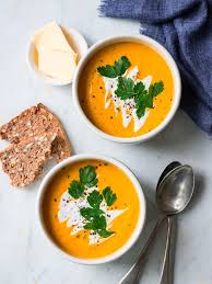 Slowly pour in vegetable broth and stir while you bring the mixture to a boil. Coconut And Ginger Pumpkin Soup Nourish Every Day