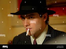Guy (STUART TOWNSEND) Regie: John Duigan aka. Head in the Clouds Stock  Photo