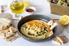 Mayim bialik is an american actress, neuroscientist, and more importantly—at least from the veggie table's point of view—vegan mom. Hummus On A White Background Pete Recipes Vegetarian Food Healthy Eating Jewish Cuisine Rustic Stock Photo Picture And Royalty Free Image Image 140225063