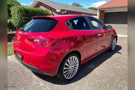 Image result for Rosso Giulietta 2012 Alfa-Romeo