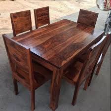 However, this table stands out a little more than some of the others because of the wooden top and painted legs. Brown Wooden Design Dining Table Rs 35000 Set N S Furniture Id 20584266730