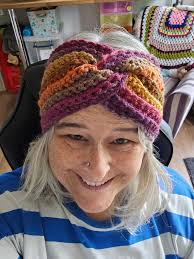 Crocheted ear warmers for rescue dog