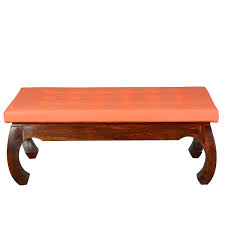 The range of distinct upholstered ottoman coffee tables — often made from fabric, metal and wood — can elevate any home. Sante Fe Leather Upholstered Solid Wood Opium Coffee Table Ottoman