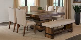 Rooms to go outlet offers an extensive inventory with incredible deals on all styles of discount dining tables. Cindy Crawford Home Westover Hills Brown 8 Pc Square Dining Room Square Dining Room Table Rustic Dining Room Table Brown Dining Room Table