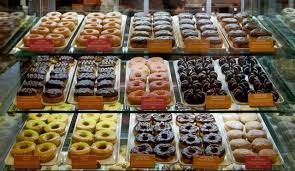 Donuts Are Displayed At The New Dunkin Donuts Store In Dlf Place In New Delhi India Cafe Food Dunkin Donuts Donut Store