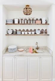 But on the bright side, there's a quick fix. Whimsical Butlers Pantry With Ornate Wood Floating Shelves Transitional Laundry Room