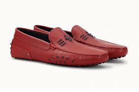 Photographer documents the haunting journey to auschwitz. Slip Your Feet Into Tod S Ferrari Driving Shoes Man Of Many