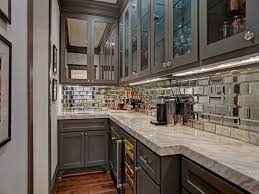 Add a finial to the intersecting corners, as shown in this photo, for additional character. Greater Heights Home For Sale Kitchen Mirror Mirror Tile Backsplash Kitchen Galley Kitchen Design