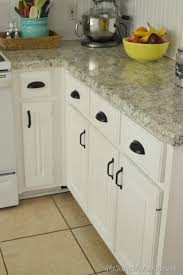 White cupboards black kitchen cabinets kitchen cabinet hardware black kitchens home kitchens shaker cabinets broom cabinet black cabinet hardware kitchen cabinetry. How To Re Paint Your Yucky White Cabinets The Frugal Homemaker