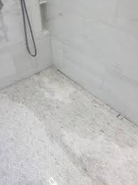 Tumbled marble tile provide a rustic and dark appearance wherever they are installed. Permanent Wet Look In White Marble Mosaic Not Good