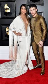 Priyanka Chopra Jonas Just Pulled A J Lo Neckline On The Grammys Red Carpet Actress Priyanka Chopra Grammy Red Carpet Bollywood Actress Bikini