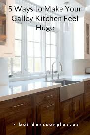 5 Ways To Make Your Galley Kitchen Feel Huge Builders Surplus Galley Kitchen Kitchen And Bath Design Kitchen