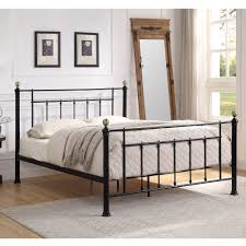 White or grey finished beds will brighten up any darker bedroom space while a black painted finish bed frame will create a romantic environment. Harpenden Black Metal Bed Frame With Brushed Brass Bedknobs Small Double Double King Size Crazypricebeds Com