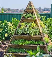 Pin By Clover S Garden Center On Idei Dlya Ogoroda Pyramid Planter Small Herb Gardens Herb Garden Design
