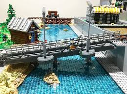 Great Work On This Tram Bridge With The Separated Tracks And Pedestrian Crossing Plus All The Great Details Reposted From Lego Track Lego Bridge Lego Trains