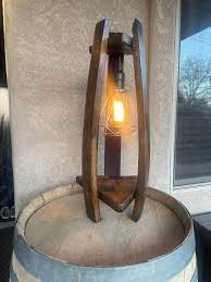 This one turned out beautiful 🍷 Instead of a round top and bottom like  others I have designed and built this time I chose to use a triangle which  complemented the angular