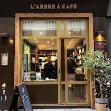 This Small Shop Larbreacafe Is One Of The Best Coffee Shops In Paris They Import Their Coffee From Ethiopia Hawa Best Coffee Shop Paris Shopping Best Coffee