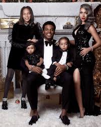 Carolina panthers quarterback cam newton was under fire on wednesday after making light of a female newton, who slumped badly last season after being named the nfl's most valuable player in 2015. Cam Newton Kia Proctor With Their Family Family Photoshoot Outfits Family Picture Outfits Family Photo Outfits