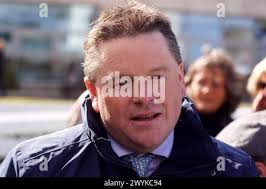 Billy Lee with trainer Paddy Twomey and groom Clare Carroll after winning  the Leopardstown Handicap onboard Moll at Leopardstown Racecourse Stock  Photo