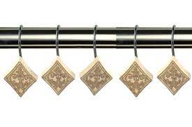 It is made of metal and resin. Fleur De Lis Living Vivian Decorative Shower Curtain Hooks Reviews Wayfair